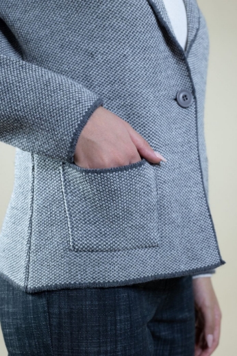Cardigan melange collo rever con tasche colore grigio