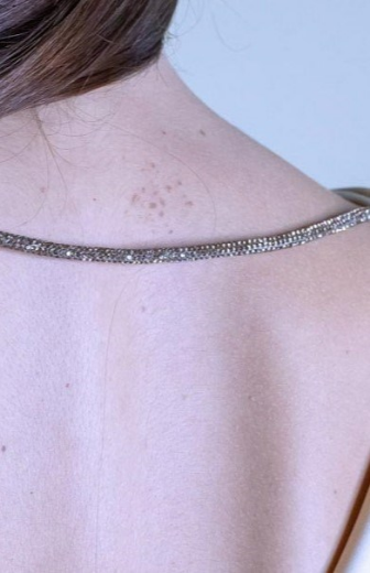 Immagine di TOP RASO COLLO PELLICANO E ACCESSORIO