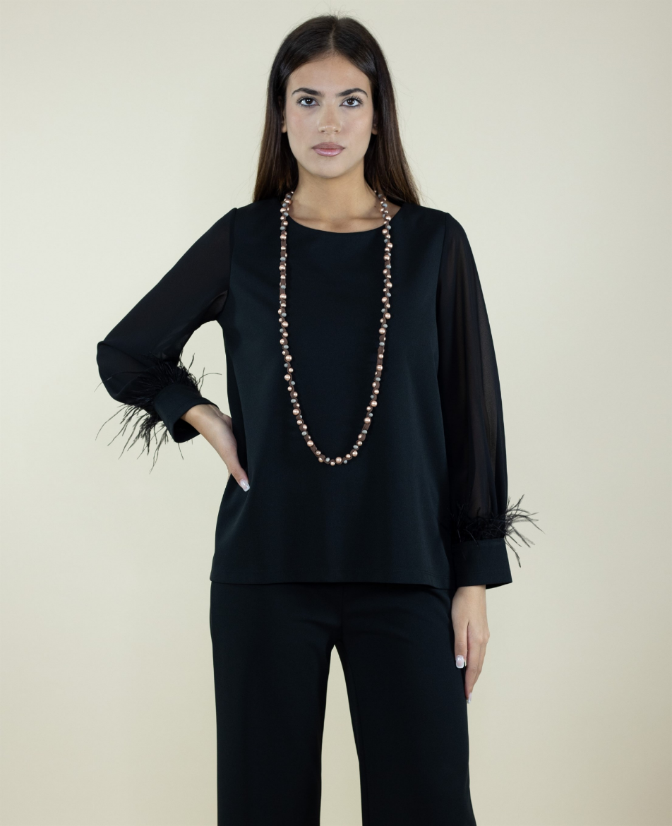 Immagine di BLUSA CON PIUME SULLA MANICA IN SCUBA