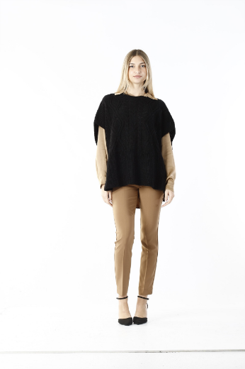 Immagine di Poncho con trecce