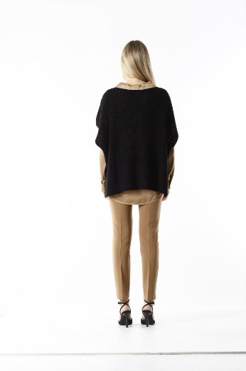 Immagine di Poncho con trecce